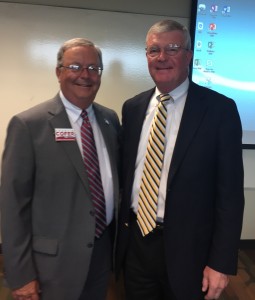 Mediator Robert A. "Bob" Cole, right, retired County Court Judge Charles Cofer 