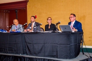 Mediator Art Garcia, at right, is joined in a panel discussion by, from left, Joseph Farina, retired chief judge of the state's 11th Circuit; A.J. Horowitz, an attorney and member of the Broward County Bar Association Board of Directors; and Darlene Gimble, attorney/mediator. ,