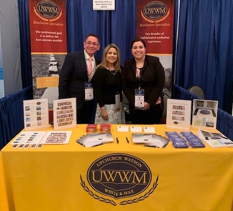 Mediator Art Garcia visited the UWWM booth when not presenting at the Broward County Bench & Bar Convention. It was tended by Norma Abreu of our West Palm Beach office and Alejandrina Perdomo of our Miami office.