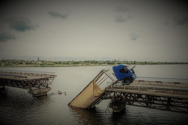 truck falls in water after bridge collapse