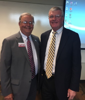 Mediator Robert A. "Bob" Cole, at right, also had a hand in last year's CME seminar; He is shown here with Charles Cofer, Public Defender for the 4th Judicial Circuit.