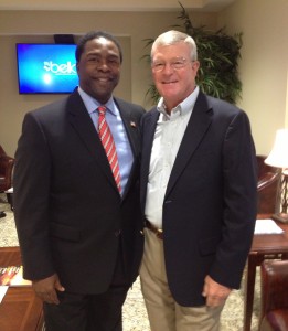 Jacksonville Mayor Alvin Brown, left, and Florida mediator Bob Cole met at the September 11, 2013, ribbon-cutting for the executive suites at the EverBank Center.