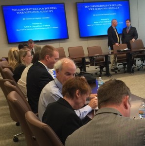 Shareholder/Mediator Robert A. "Bob" Cole, standing left, and Bryan Renzio prepare to deliver their CLE presntation on March 14, 2016.