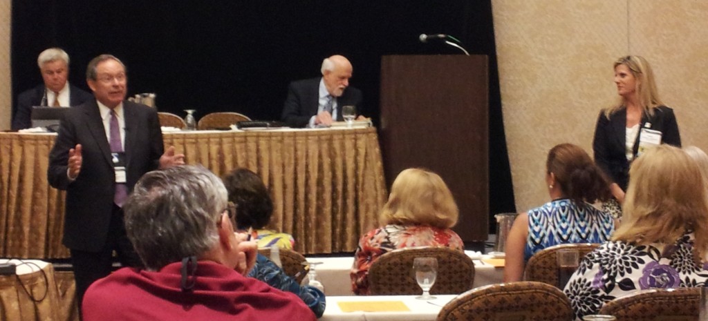 Florida mediators John Upchurch and Sandra Upchurch, standing, present for the recent Florida Bar Annual Convention in Boca Raton. 